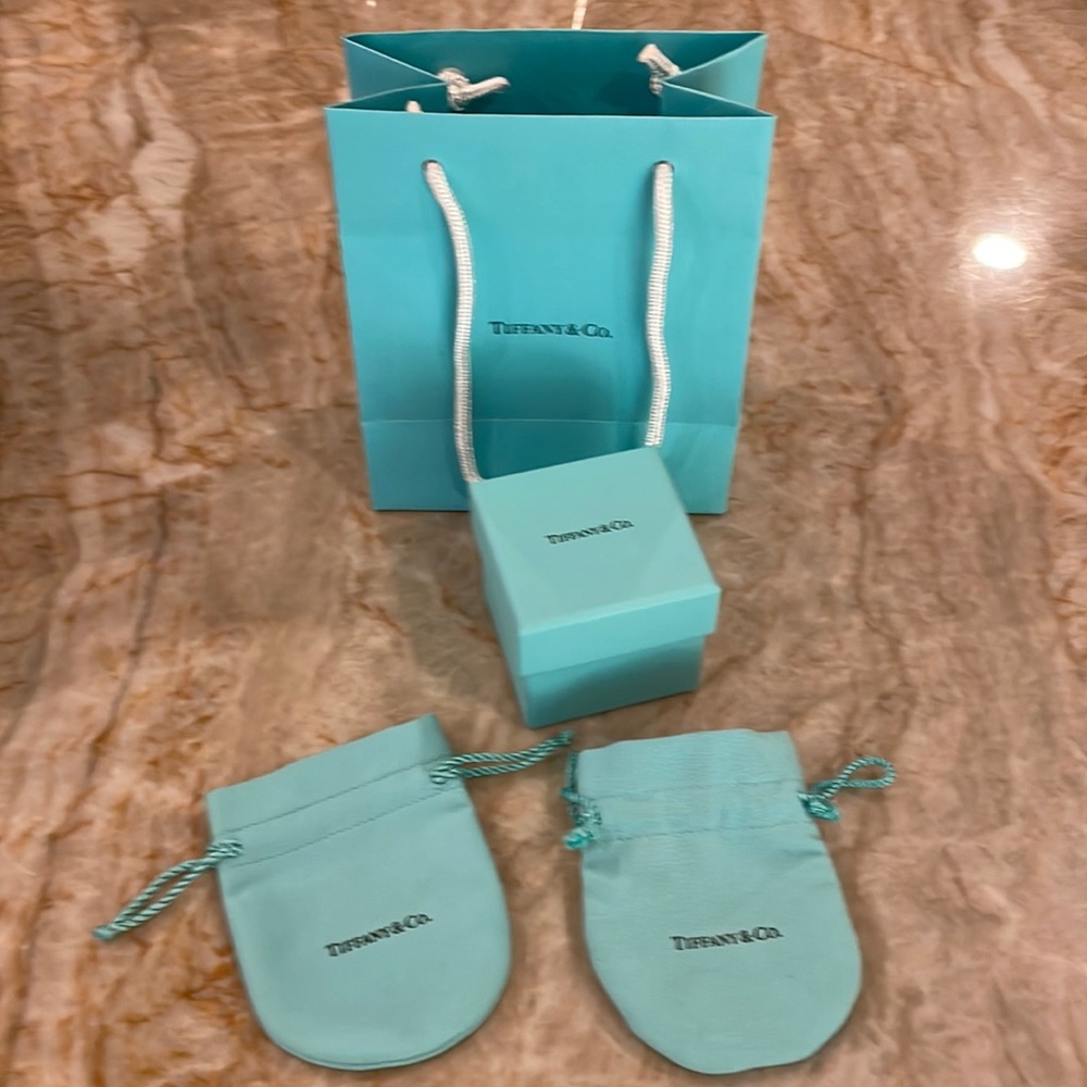 Tiffany ring box 2"x 2"x2" w small gift bag, and 2 jewelry pouches.